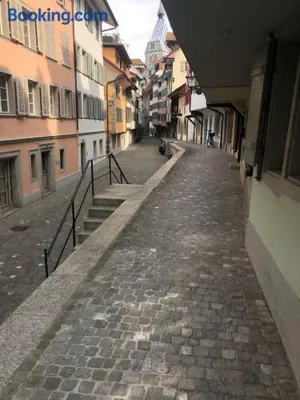 Image of Bedroom cum office with shared shower in Zug's Old Town