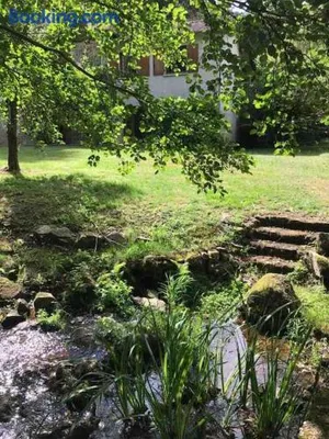 Image of Ancient Mill with Beautiful Lake and Streams