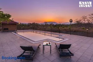Image of StayVistas Nyra Farms - Hill-view villa with Pool, Indoor & Outdoor games, & Lawn with Gazebo