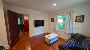 Image of Plaid Pad - Stylish Retreat 12 min to Airport & Downtown