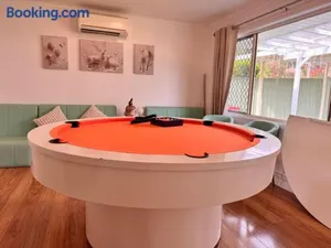 Image of Fairyland Getaway- at Central Coast with XXXL hot Jacuzzi & Fun - Round pool table and Slide bunk bed