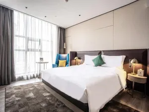 Image of Echarm Plus Hotel (Wuxi Changjiang North Road Taihu Garden Metro Station)