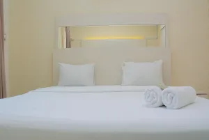 Image of Minimalist and Comfy 1BR at The Boulevard Apartment By Travelio