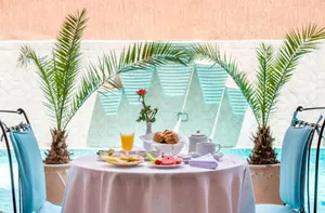 Image of Hôtel Les Trois Palmiers