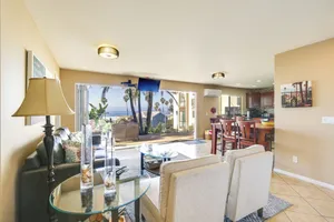 Image of Tropical Oceanside Home with Deck, Walk to Beach