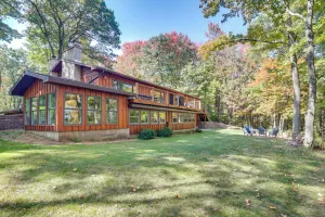 Image of Rhinelander Chain of Lakes Home w/ River Dock!