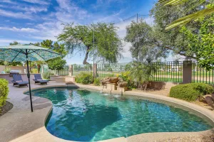 Image of Pool and Putting Green Goodyear Home on Golf Course