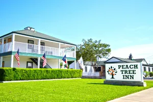 Image of Peach Tree Inn & Suites
