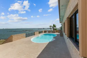 Image of Bay Dreamer - Massive Bayfront Home W/ Private Pool 3 Bedroom Home by RedAwning