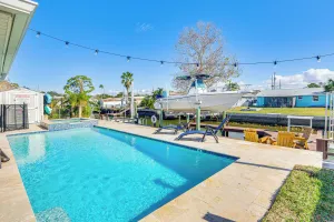 Image of Spacious Canalfront Home with Pool about half Mi to Beach