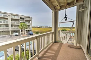 Image of Coastal Condo with Pool Access - Steps to Beach