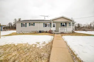 Image of Waterfront Evart House on Chippewa Lake Channel