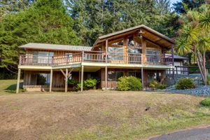 Image of Tree-lined Gold Beach Retreat w/ Multiple Decks!
