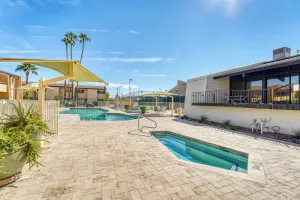 Image of 2BR Sleeps 6 Pool BBQ Gym Hot Tub & Bar Hopping!
