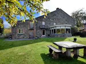 Image of Rustic house with sunroom