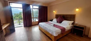 Image of The Whispering Pines by Summit, Lachung