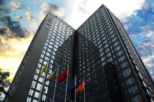 Image of La Perle International Hotel - Free shuttle between hotel and Exhibition Center during Canton Fair & Exhibitor registration Counter