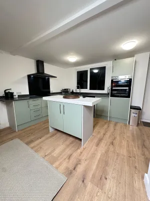 Image of House-Sleeps8-Parking-Garden