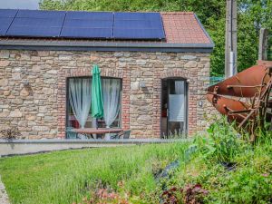 Image of Holiday home Escale J-P in Manhay with a garden
