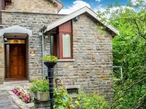 Image of A Small Studio of a Nature Stone House