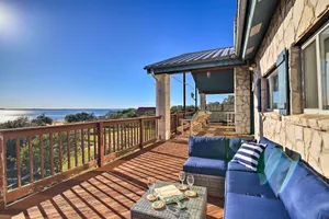 Image of Sunny Lakefront Escape with Private Beach and Deck