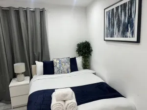 Image of Lovely Apartment with free parking on premises.