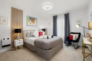 Image of Beach Block 2-Bed with Coastal Palm Trees and Yard