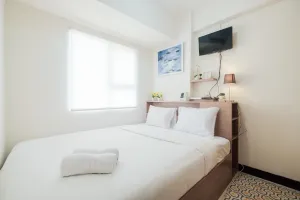Image of Comfortable 2BR Apartment at Cinere Resort By Travelio