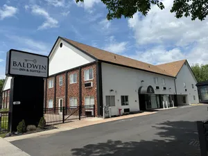 Image of Baldwin Inn & Suites, SureStay Collection by Best Western