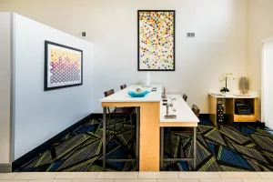 Image of Holiday Inn Express & Suites Charlotte Arpt-Belmont by IHG