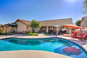 Image of Elegant Peoria Home Pool, Putting Green, Fire Pit