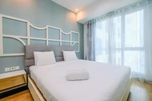 Image of Minimalist Furnished 1BR Apartment at Casa Grande Residence By Travelio