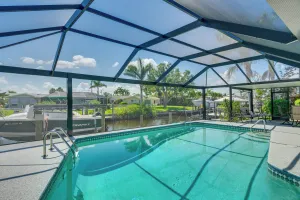 Image of Canalfront Home with Dock and Pool 5 Mi to Ft Myers!