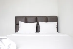 Image of Homey 2BR Majesty Apartment near Maranatha University By Travelio