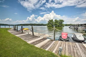 Image of Balcony and Lake Access Hot Springs Getaway!