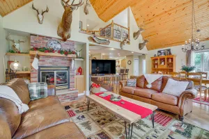 Image of Lakefront Neillsville Home w/ Fire Pit, Game Room!