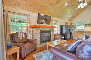 Image of Cozy Riverfront Cabin with Private Deck and Hot Tub!