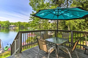Image of Northern Michigan Lake House with Boat Dock and Kayaks