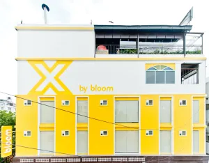Image of X by Bloom l Manyata