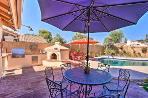 Image of Elegant Peoria Home Pool, Putting Green, Fire Pit