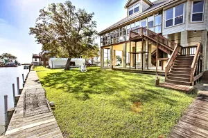 Image of Private Dock with Lift Waterfront New Orleans Home!