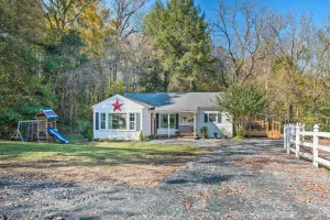 Image of Peaceful Renovated Home with Deck on Half Acre!