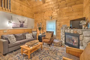 Image of Cozy Retreat with Porch and Double JJ Resort Access!