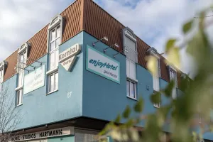 Image of enjoyHotel garni Korntal Stuttgart b&b Parkplatz Sprinter Penny eTank