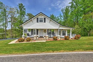 Image of Dobson Farmhouse with Wraparound Porch and Fire Pit!