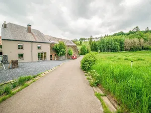 Image of Beautiful Home in Leglise With a Garden and Pond