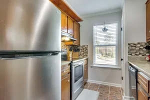 Image of Comfy Augusta Condo w/ Deck ~ 4 Mi to Olde Town