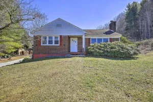 Image of Quaint Creekside Home with Spacious Deck and Yard