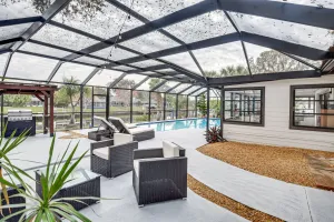 Image of Canal-front Palm Coast Home: Dock & Outdoor Pool!