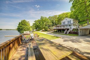 Image of Big Pine Island Lake Cottage with Boat Dock and Kayaks